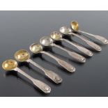 A set of seven George IV and later silver salt spoons