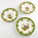 P Simpson for Coalport, three painted dessert plates