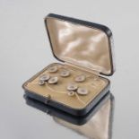 A set of 18 carat gold, 9 carat and mother of pearl studs, buttons and cufflinks