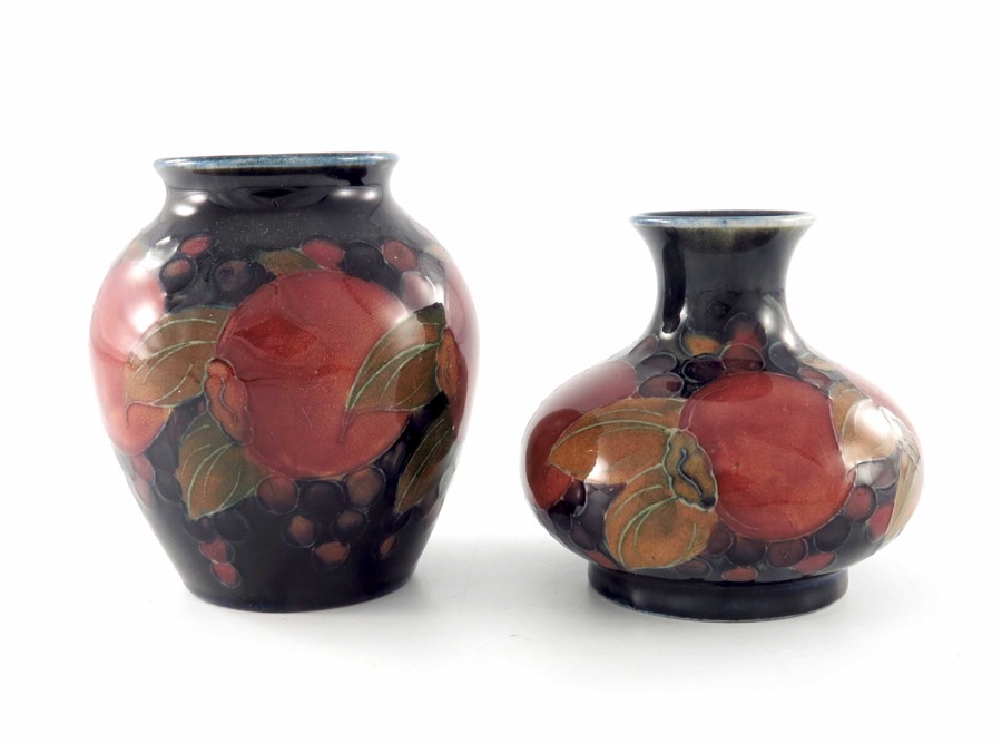 William Moorcroft, two small Pomegranate vases