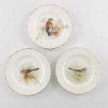 W Powell for Royal Worcester, three small bird painted plates