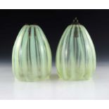 A pair of Arts and Crafts opal glass light shades, probably John Walsh Walsh