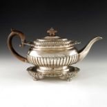 A George III silver teapot on stand, J E Terrey and Co., London 1817