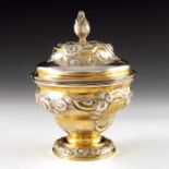 A George II silver gilt sugar box, Samuel Taylor, London 1751