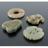 Four Chinese carved jade pendants