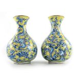 A pair of Chinese enamelled vases