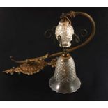 A pair of Victorian gilt brass and cut glass wall lights