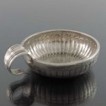 A Louis XV French silver wine taster, IF, Orleans 1774
