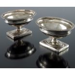 A pair of Victorian silver salt cellars, Charles Stuart Harris, London 1881