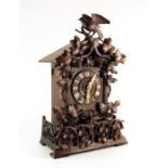 A 19th century Black Forest carved Swiss cuckoo clock