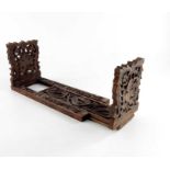 A 19th century Anglo Indian carved rosewood book slide