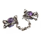 Sybil Dunlop (attributed), an Arts and Crafts silver and amethyst chain brooch