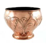 An Arts and Crafts copper jardiniere