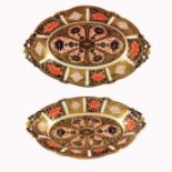 A pair of graduated Royal Crown Derby Imari 1128 oval dishes