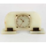 An Art Deco onyx and bronze clock, Garrard and Co