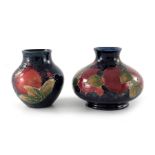 William Moorcroft, two small Pomegranate vases