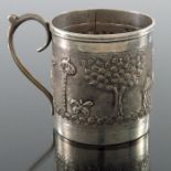 An Indian white metal mug, late 19th century
