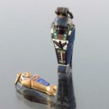Two silver and gilt enamelled novelty Egyptian revival pendant lockets
