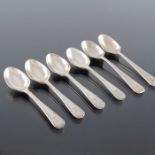 A set of four Victorian silver egg spoons and a pair of George VI examples