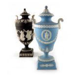 Two Wedgwood Jasperware urn vases and covers