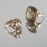 Two 9 carat gold and gem set rings