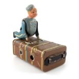 A Schuco Express Boy clockwork tin toy