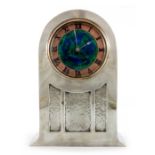 David Veasey for Liberty and Co., an Arts and Crafts Tudric pewter and enamelled dial mantle clock