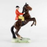 A Beswick figure Huntsman on Rearing Horse