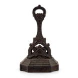 Christopher Dresser for Kenrick and Sons, an Aesthetic Movement cast iron door stop, circa 1885