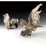 A pair of Italian silver gilt cockerel figures