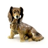 A Karl Ens figure of a long haired dachshund