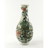 A Chinese porcelain baluster vase, late 19th Century, painted in the famille verte palette with