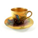 Reg Johnson for Royal Doulton, a coffee cup and saucer