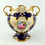 E Wood for Royal Doulton, a floral painted twin handled vase