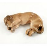 Knud Kyhn for Royal Copenhagen, a model of a sleeping dachshund