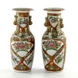 A pair of Cantonese enamel baluster vases, 19th Ce