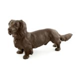 A Meissen Bottger Steinzeug figure of a long haired dachshund