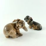 Two Royal Copenhagen figures of dachshund puppies