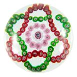 Baccarat, a millefiori garland glass paperweight