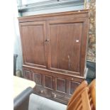 18th century panelled oak bacon cupboard on four panelled base, two draws 153cm wide