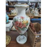 A French opaline glass and enamelled pedestal vase, painted with floral bouquet