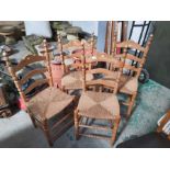 Pair of ladderback chairs, a heavy teak single chair, four pine ladderback chairs 7