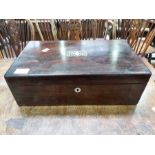 A 19th century mother of pearl inlaid rosewood writing box, 41cm wide