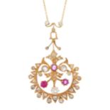 An early 20th century gold, ruby and diamond foliate openwork necklace