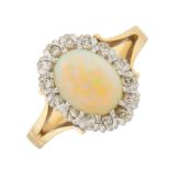 A mid 20th century 18ct gold opal and diamond cluster ring