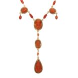 A 19th century gold, carved coral cameo necklace