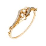 A mid 20th century 18ct gold cultured pearl and diamond hinged bangle