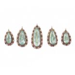 A set of late 19th century foil-back quartz, garnet and split pearl jewellery components