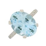 A platinum aquamarine single-stone and diamond dress ring