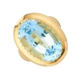 An 18ct gold aquamarine single-stone dress ring